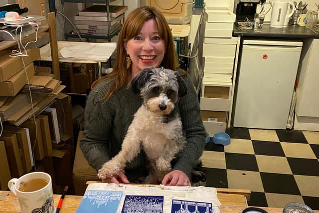 Suzanne O’Leary's and her dog Bertie at Little Beach Boutique in Brighton
