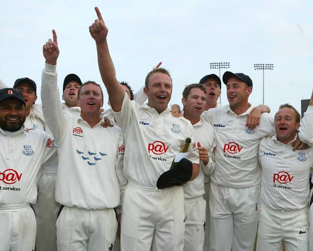 Chris Adams and Tony Cottey were among the Sussex players celebrating lifting the county championship in 2003 / Picture: Getty