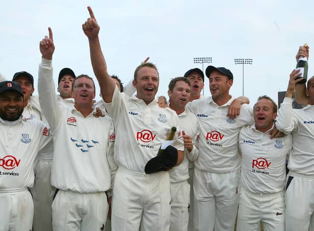 Chris Adams and Tony Cottey were among the Sussex players celebrating lifting the county championship in 2003 / Picture: Getty