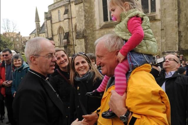 The Archbishop of Canterbury, The Most Rev Justin Welby greets the Chichester locals in 2013. Picture by Louise Adams C130392-1 Chi Archbishop