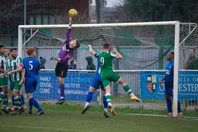 Goalmouth action between Chichester City and Three Bridges / Picture: Neil Holmes