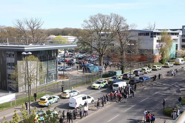Police cars outside Crawley College on the day of the incident