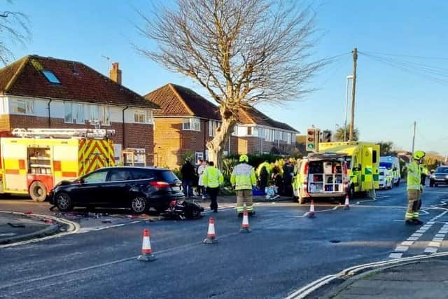 Police officers, paramedics and firefighters have been called to the collision on Terringes Avenue. Photo: Eddie Mitchell