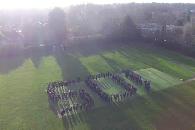 The pupils formed the five and zero digits, whilst the staff organised themselves into an exclamation mark.