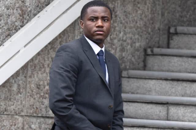 Beryly Lubala outside of Brighton Crown Court