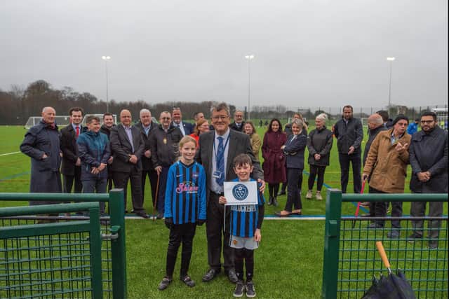 Ken Benham, chief executive at Sussex County FA, has cut the ribbon to open Palatine Park Football Centre in Worthing