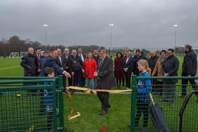 Ken Benham, chief executive at Sussex County FA, has cut the ribbon to open Palatine Park Football Centre in Worthing