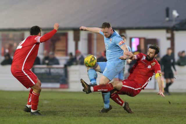 Ben Pope battles on a tricky pitch at Whitstable / Picture: Scott White