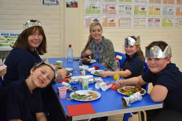 West Sussex Alternative Provision College students enjoying their meal with teachers