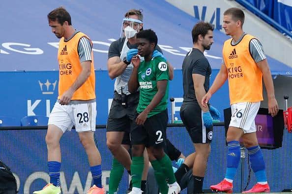 Tariq Lamptey receives treatment during his bruising debut at Leicester in 2020