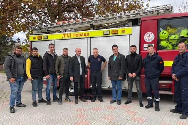 Roy Barraclough with the North Macedonian firefighters after delivering a trio of fire engines