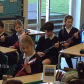 St Mary’s Primary School children at their Ukulele lesson.