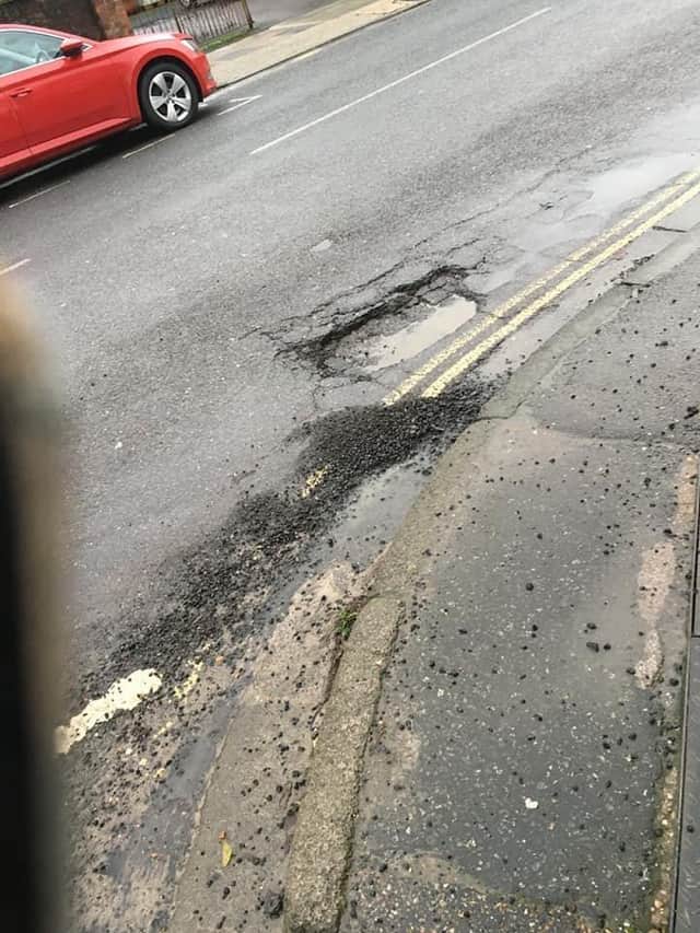 Residents have called upon the council to help repair potholes in the Chichester area like this one on St Paul's Road in Chichester. Pic courtesy of Stephen Kane