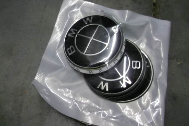 Fake BMW badges. Picture from East Sussex County Council SUS-220125-102959001