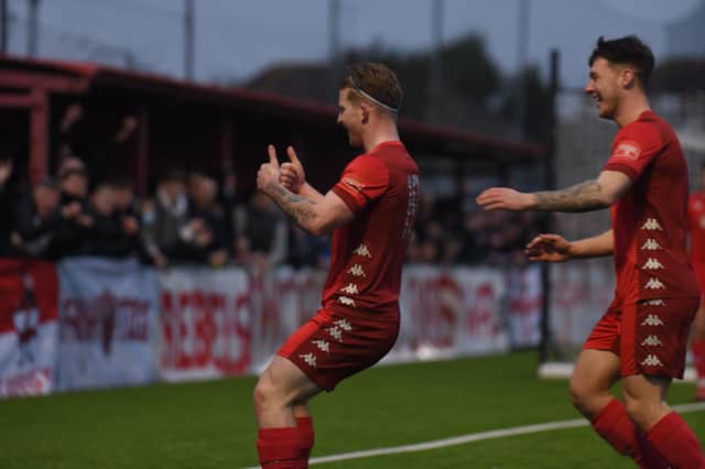 Jasper Pattenden soaks up the plaudits after putting Worthing ahead against Hornchurch / Picture: Marcus Hoare