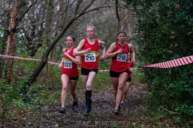 Grace and Esme, centre and left, in the U15 girls' race