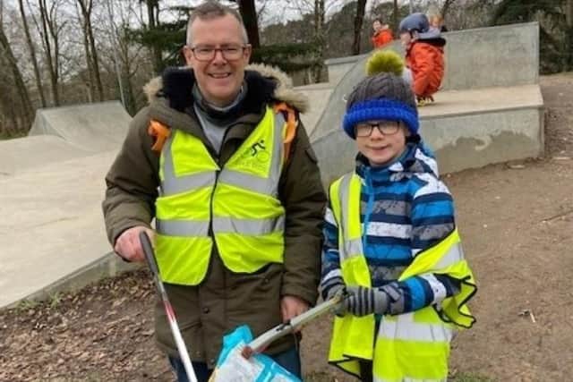 Jake and his father at the litter pick. Picture: Haywards Heath Town Council.