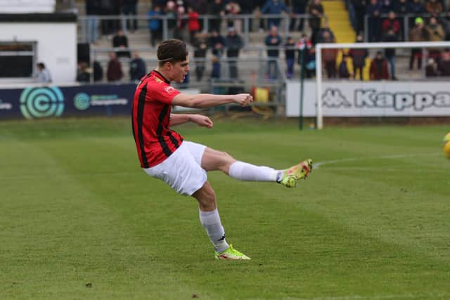 Ollie Tanner fires home a Lewes free-kick / Picture: James Boyes