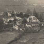 Aerial view of the village of South Harting, nestled in the South Downs