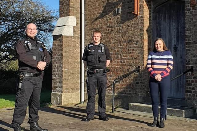 PCSO Daryl Holter, PC Zachary Hayns and St Luke's Church warden Imogen Lade. Picture from Sussex Police SUS-220102-130736001
