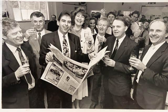 Barry, left, with some of the County Times staff