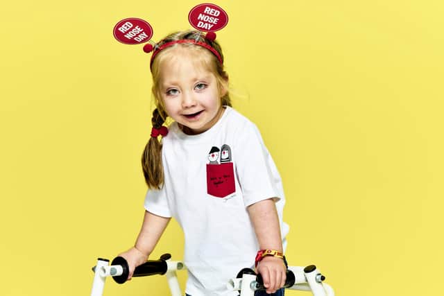 Five-year-old Willow marched around her garden three times with her walking frame in aid of Red Nose Day last year and raised £8,170 for Comic Relief