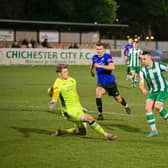 Callum Overton puts Chichester City ahead against Burgess Hill / Picture: Neil Holmes
