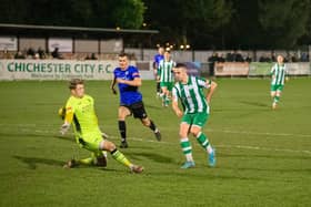 Callum Overton puts Chichester City ahead against Burgess Hill / Picture: Neil Holmes