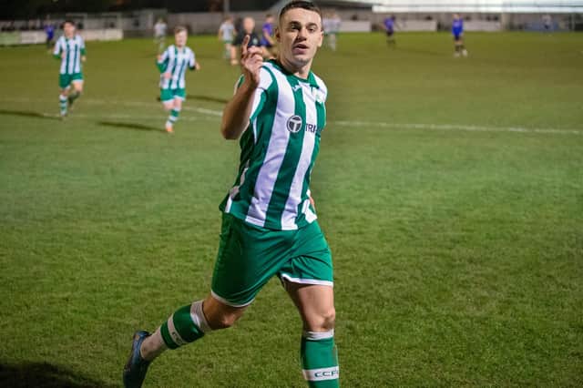 Callum Overton celebrates putting Chichester City ahead against Burgess Hill / Picture: Neil Holmes