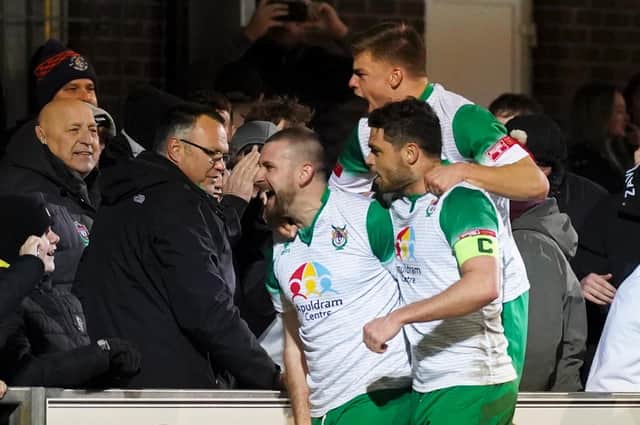 Bognor players and fans jubilant after James Crane's penalty puts them 3-2 up v Corinthian-Casuals / Picture: Trevor Staff