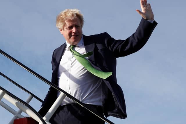 LONDON, UNITED KINGDOM - FEBRUARY 01:  British Prime Minister Boris Johnson boards an aircraft as he departs to meet with Ukrainian President Volodymyr Zelenskiy, February 1, 2022 in London, England. The prime minister will hold talks with President Volodymyr Zelenskyy in a show of support for Ukraine as 100,000 Russian troops amass on the Ukraine border. The UK also announces £88m of new funding for Ukraine to help reduce its reliance on Russian energy supplies. (Photo by Peter Nicholls - WPA Pool/Getty Images) NNL-220202-134806001