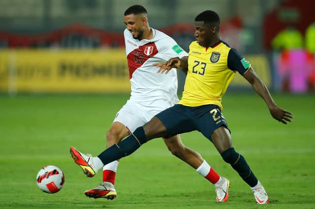 Brighton & Hove Albion's Moises Caicedo, right, in action for Ecuador in their recent South American World Cup qualifier against Peru. Picture by Ernesto Benavides/AFP via Getty Images