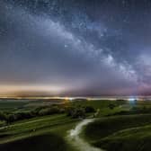The milkyway above the lights of Worthing and Brighton from Cissbury Ring by Neil Jones SUS-220702-091031001