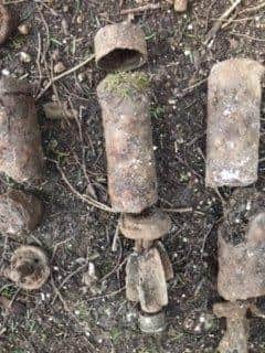 Several World War Two mortars were found in the woods at Kingley Vale. Picture courtesy of Sefton Jones and Karl Venus. SUS-220802-140529001