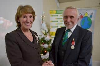 Vernon Jennings receiving his British Empire Medal in 2015 from the Lord Lieutenant of West Sussex, Susan Piper