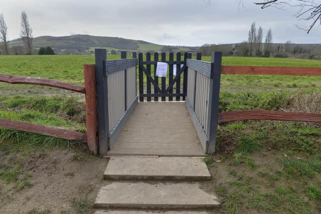 Wooden bridge behind Spur Road in Polegate which developers are going to remove (Photo by Jon Rigby) SUS-220902-111203008
