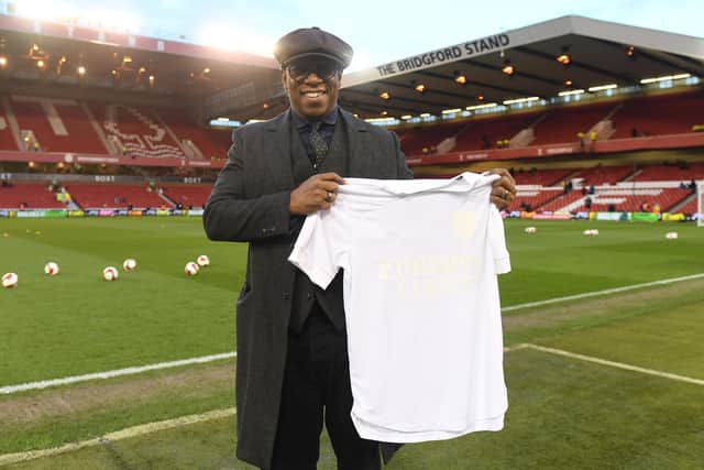 Ian Wright with the white Arsenal shirt worn by the team in their FA Cup tie at Nottingham Forest to highlight the No More Red campaign / Picture: Getty