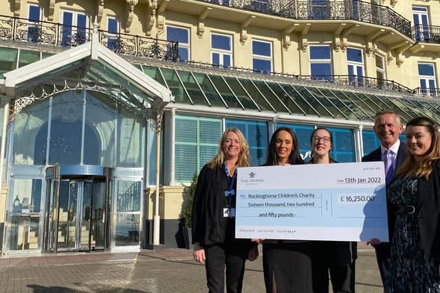 Staff at The Grand Hotel with a cheque for the Rockinghorse children's charity