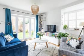 The sitting room benefits from a triple aspect and has a central bay window and French doors that lead out to the garden. Picture: Move Revolution.