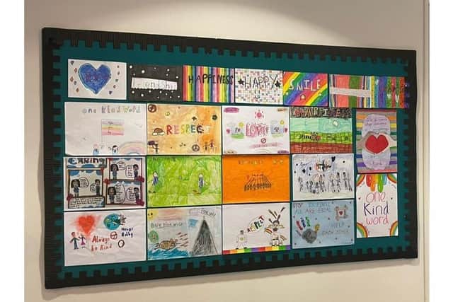 The Wall of Kindness made from a selection of posters created by schoolchildren across Brighton and Hove