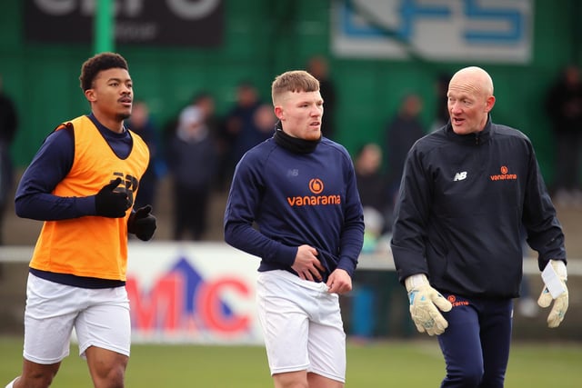Assistant-manager Paul Bastock talks to Jordon Crawford and Decarrey Sheriff during the warm-up