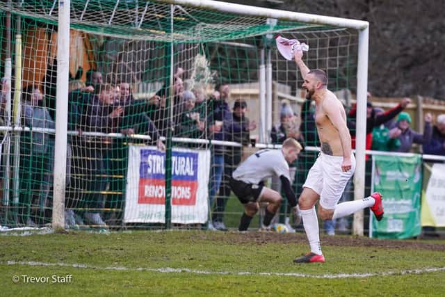 James Crane celebrates putting Bognor ahead from the spot - and gets booked for it / Picture: Trevor Staff