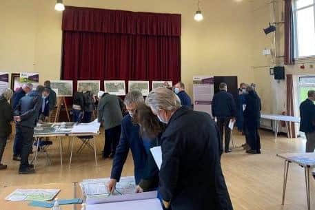 Members of the public look at the latest proposals for the A27 Arundel bypass at the recent event in Walberton