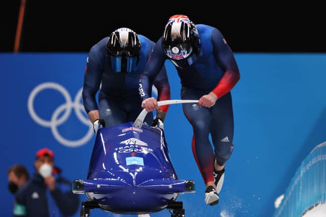 Brad Hall and Nick Gleeson push off at the start during the 2-man Bobsleigh Heats on day 10 of Beijing 2022 Winter Olympic Games at National Sliding Centre. (Photo by Alex Pantling/Getty Images)