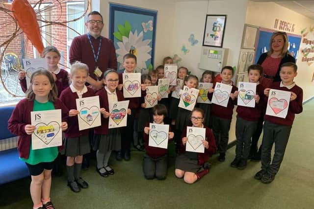 Children at The Globe Primary Academy took part in a Valentine's drawing competition. Entries were displayed at Jacobs Steel estate agents.