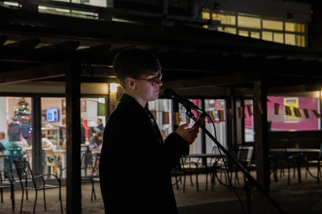 Rylee at the candlelit vigil in memory of those who have lost their lives to anti-transgender violence. Picture by The University of Chichester.