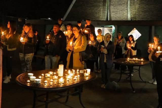 Staff and students at the candlelit vigil. Picture by The University of Chichester.