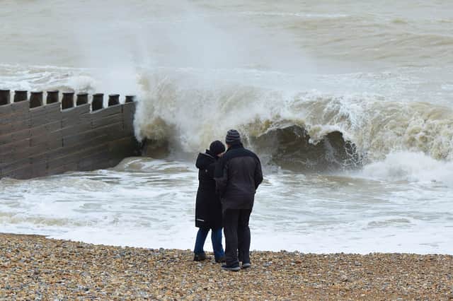 Waves lash Eastbourne beach during Storm Eunice SUS-220222-115951001