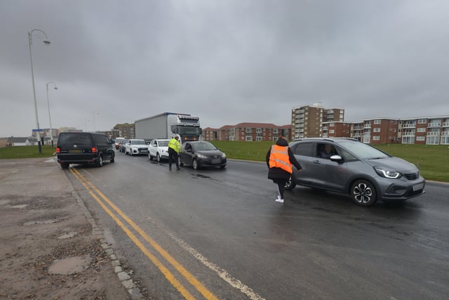 South East Water handing out bottles of water to residents outside Bexhill Sea Angling Club after Storm Eunice caused a lack of power to water pumping stations. SUS-220222-123156001
