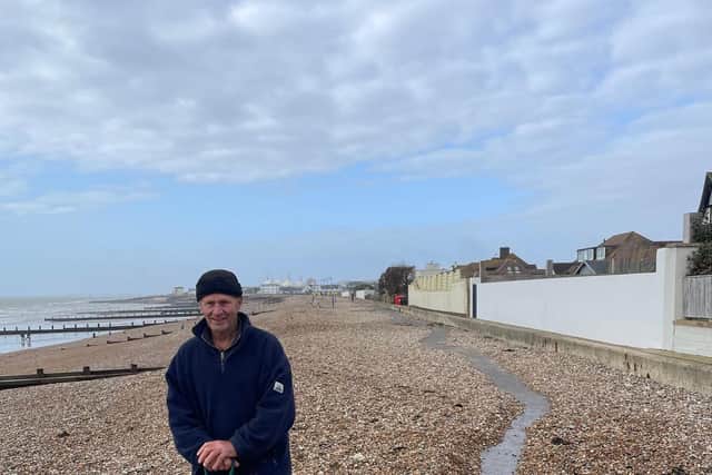 Ross Fisher clearing out a path along Felpham promenade